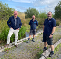 Greenock Cut Visitor Centre Inverclyde Council rangers Mike Holcombe and John MacLean with Councillor Michael McCormick